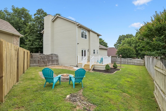 3453 Parkwood Ct, Hermitage, TN 37076 - back of property featuring a wooden deck and an outdoor fire pit