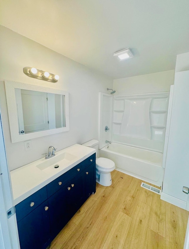 1714 Stanfiel St, Chattanooga, TN 37406 - full bathroom featuring wood finished floors, vanity, toilet, and tub / shower combination