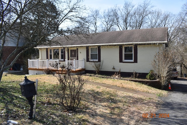 5061 Mclendon Dr, Antioch, TN 37013 - single story home featuring brick siding, a shingled roof, and a deck