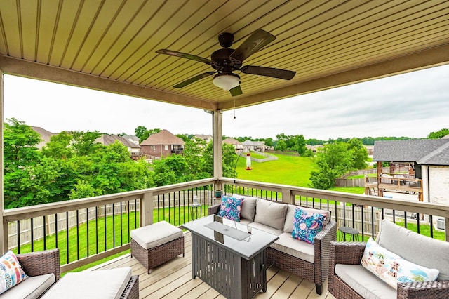 1184 Wicke Rd, Adams, TN 37010 - wooden deck featuring an outdoor hangout area, a ceiling fan, a yard, and a residential view