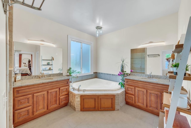 5950 Clarksville Pike, Joelton, TN 37080 - ensuite bathroom with a garden tub, two vanities, and tile patterned floors
