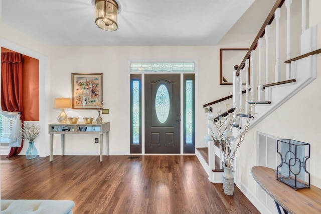 5950 Clarksville Pike, Joelton, TN 37080 - foyer entrance with wood finished floors, healthy amount of natural light, baseboards, and stairs