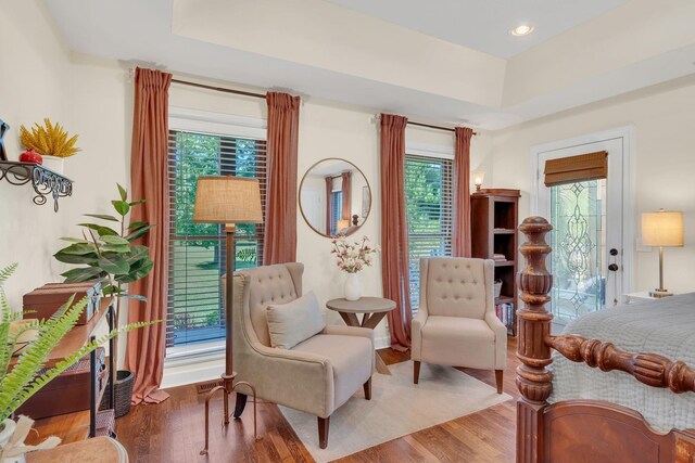 5950 Clarksville Pike, Joelton, TN 37080 - bedroom featuring wood finished floors, access to exterior, a tray ceiling, recessed lighting, and baseboards