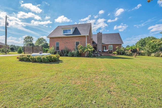 5950 Clarksville Pike, Joelton, TN 37080 - rear view of house with brick siding and a lawn