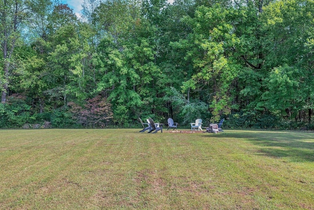 5950 Clarksville Pike, Joelton, TN 37080 - view of green lawn with an outdoor fire pit