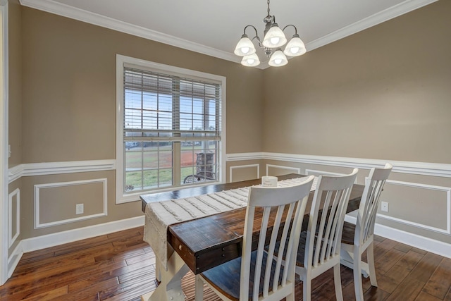 152 Camaro Dr, Chapmansboro, TN 37035 - dining space featuring a chandelier, ornamental molding, hardwood / wood-style flooring, a wainscoted wall, and a decorative wall