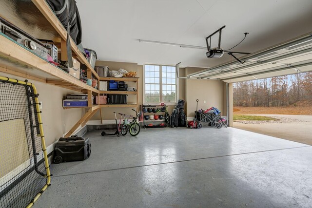 152 Camaro Dr, Chapmansboro, TN 37035 - garage featuring a garage door opener