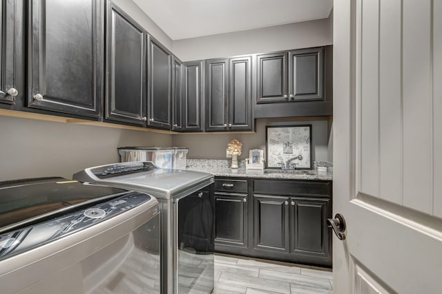 152 Camaro Dr, Chapmansboro, TN 37035 - washroom featuring cabinet space and washer and clothes dryer