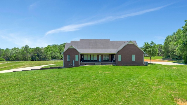 152 Camaro Dr, Chapmansboro, TN 37035 - ranch-style home with a front lawn and central air condition unit