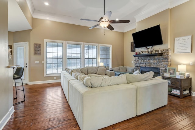 152 Camaro Dr, Chapmansboro, TN 37035 - living area featuring ornamental molding, dark wood finished floors, a ceiling fan, baseboards, and a fireplace