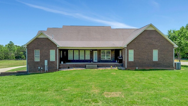 152 Camaro Dr, Chapmansboro, TN 37035 - view of front of home featuring a front yard, brick siding, and a porch