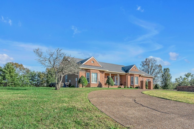 161 Graystone Dr, Gallatin, TN 37066 - view of front of property featuring brick siding and a front lawn