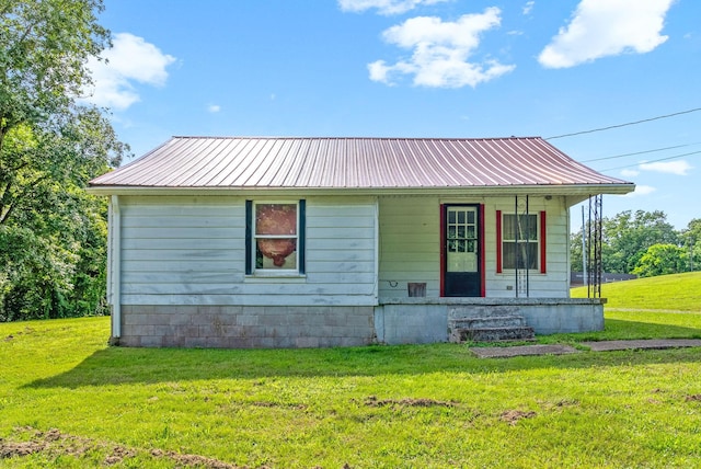 154 Crains Landing Rd, Dover, TN 37058 - view of front of house featuring covered porch, a front yard, and metal roof