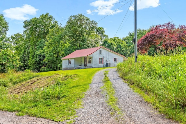 154 Crains Landing Rd, Dover, TN 37058 - bungalow-style home with gravel driveway and metal roof