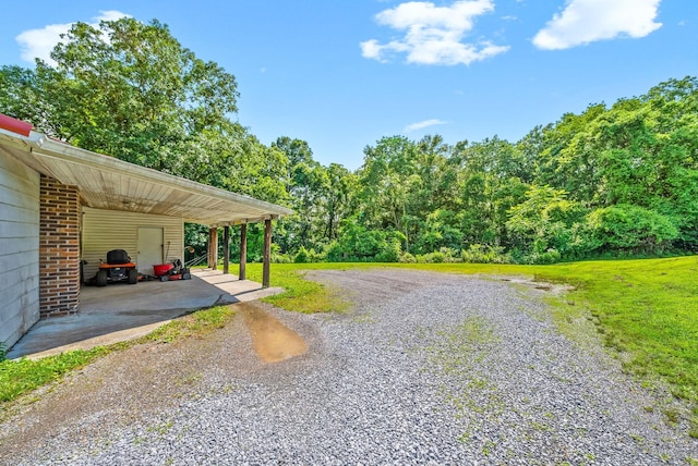 154 Crains Landing Rd, Dover, TN 37058 - view of dirt / gravel driveway featuring a forest view