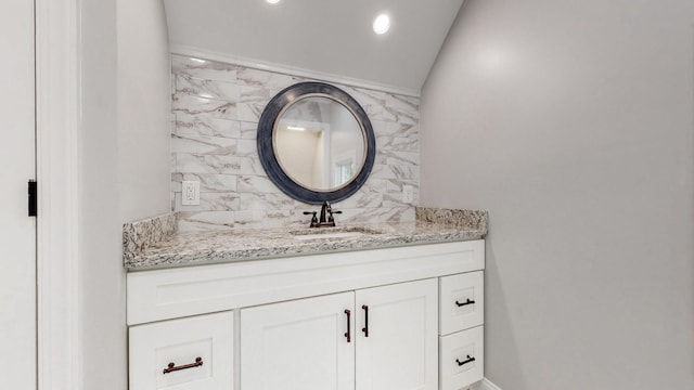 20 Daniels Dr, Franklin, TN 37064 - bathroom featuring vanity, tasteful backsplash, and vaulted ceiling