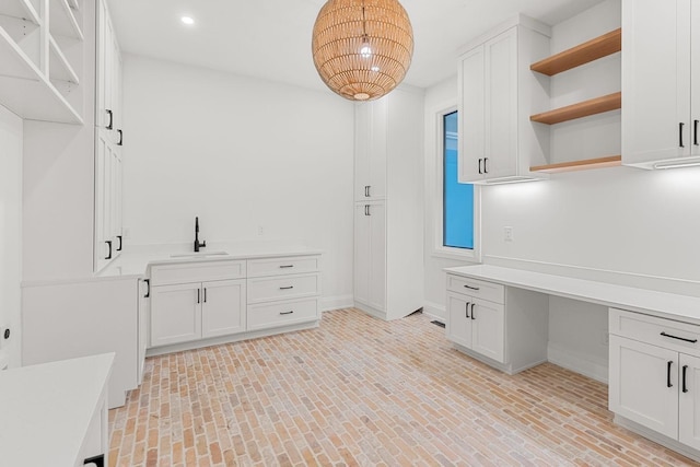 2915 Compton Rd, Nashville, TN 37215 - interior space featuring open shelves, a sink, baseboards, light countertops, and recessed lighting
