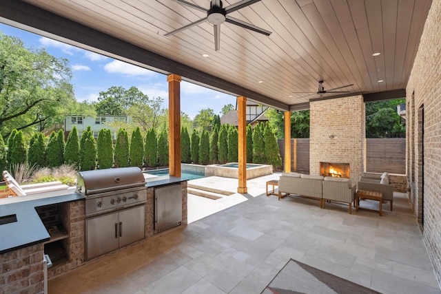 2915 Compton Rd, Nashville, TN 37215 - fenced backyard with a patio area, ceiling fan, and an outdoor living space with a fireplace