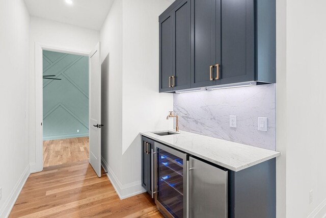 2915 Compton Rd, Nashville, TN 37215 - indoor wet bar with wine cooler, light wood-type flooring, backsplash, baseboards, and recessed lighting