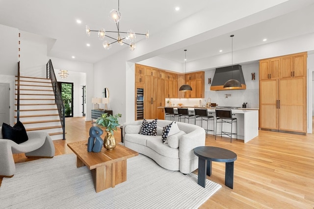 2915 Compton Rd, Nashville, TN 37215 - living area featuring light wood-style floors, recessed lighting, stairs, and a chandelier