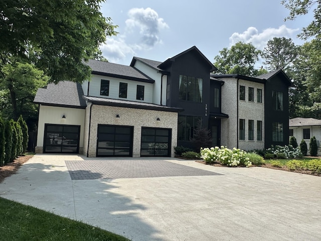 2915 Compton Rd, Nashville, TN 37215 - view of front of house with decorative driveway and a garage