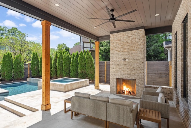 2915 Compton Rd, Nashville, TN 37215 - fenced backyard featuring an outdoor brick fireplace, a patio, an in-ground hot tub, and ceiling fan
