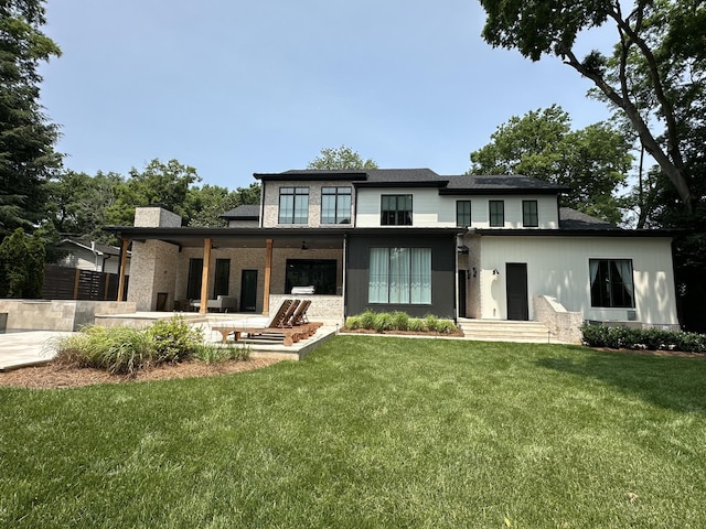 2915 Compton Rd, Nashville, TN 37215 - rear view of house with a lawn and a chimney