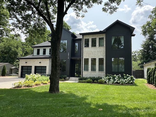 2915 Compton Rd, Nashville, TN 37215 - contemporary house with a garage, driveway, and brick siding