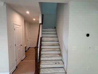 1040 Cherry Tree Dr, Mount Juliet, TN 37122 - stairway with recessed lighting and baseboards