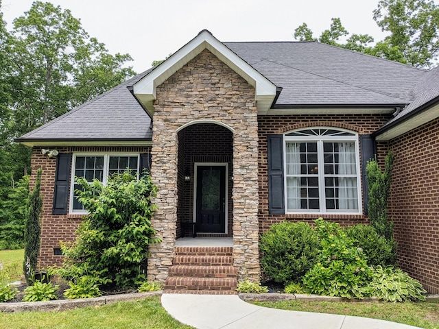 31 Chickory Ln, Monteagle, TN 37356 - view of front of house with a shingled roof, brick siding, and stone siding