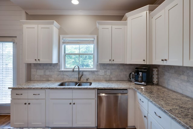 2001 Katach Ct, Spring Hill, TN 37174 - kitchen featuring stainless steel dishwasher, white cabinets, crown molding, tasteful backsplash, and light stone counters