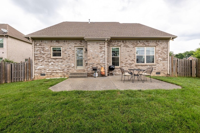 2001 Katach Ct, Spring Hill, TN 37174 - back of property featuring crawl space, a fenced backyard, brick siding, and a patio area