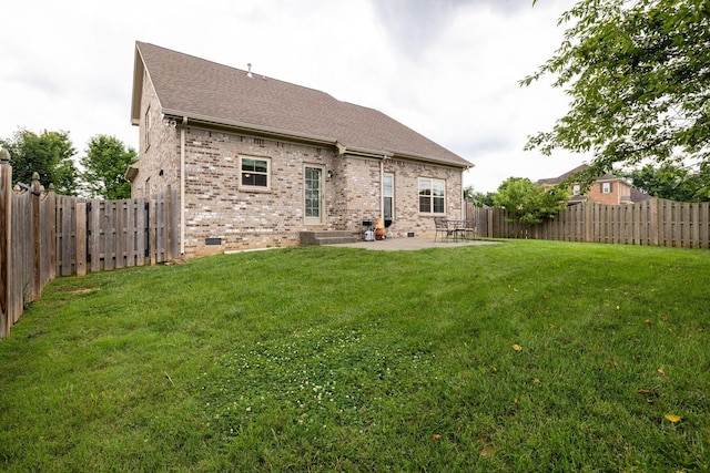 2001 Katach Ct, Spring Hill, TN 37174 - rear view of house with crawl space, brick siding, a fenced backyard, a patio area, and roof with shingles