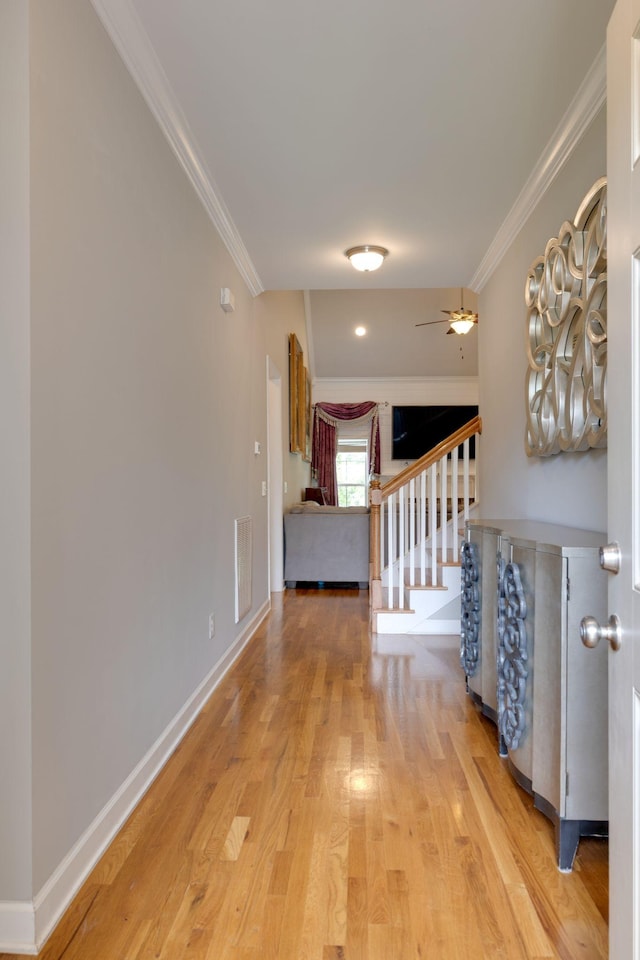 2001 Katach Ct, Spring Hill, TN 37174 - corridor with light wood-style flooring, ornamental molding, and stairway