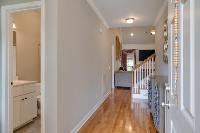 2001 Katach Ct, Spring Hill, TN 37174 - hall featuring ornamental molding, light wood-type flooring, and stairs