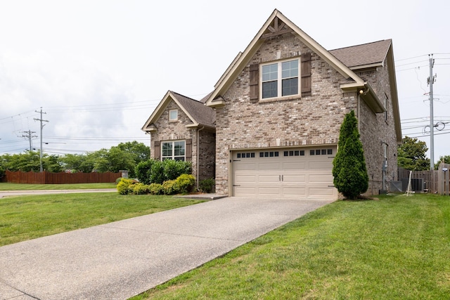 2001 Katach Ct, Spring Hill, TN 37174 - view of front of home featuring a garage, concrete driveway, brick siding, and a shingled roof
