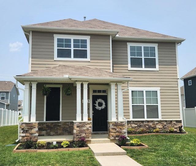 1013 Pepper Stone Dr, Lebanon, TN 37087 - view of front facade featuring stone siding, covered porch, and roof with shingles