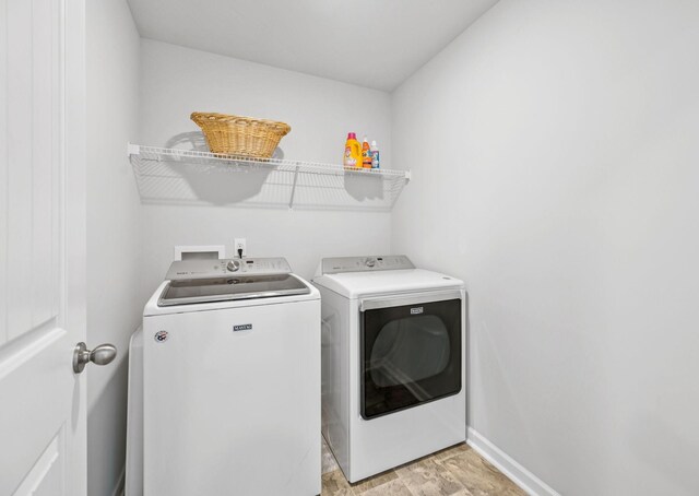 1013 Pepper Stone Dr, Lebanon, TN 37087 - laundry room with washer and clothes dryer and baseboards