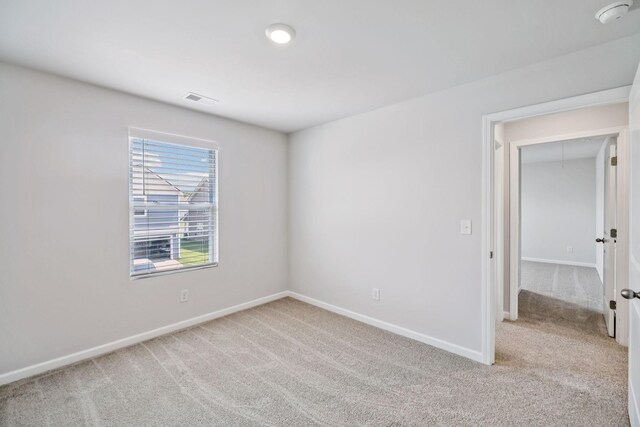 1013 Pepper Stone Dr, Lebanon, TN 37087 - spare room featuring light carpet and a smoke detector