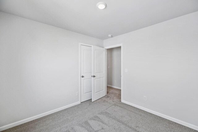 1013 Pepper Stone Dr, Lebanon, TN 37087 - carpeted empty room featuring baseboards