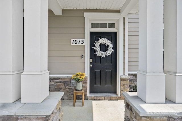 1013 Pepper Stone Dr, Lebanon, TN 37087 - property entrance featuring stone siding and covered porch