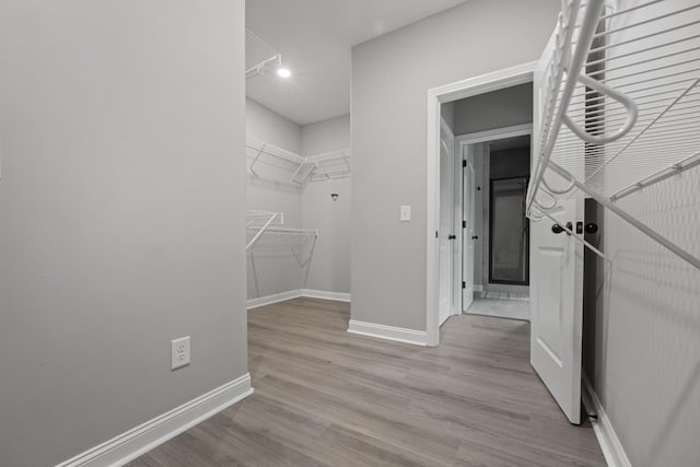 276 Indian Creek Rd, Cumberland Furnace, TN 37051 - walk in closet with wood finished floors