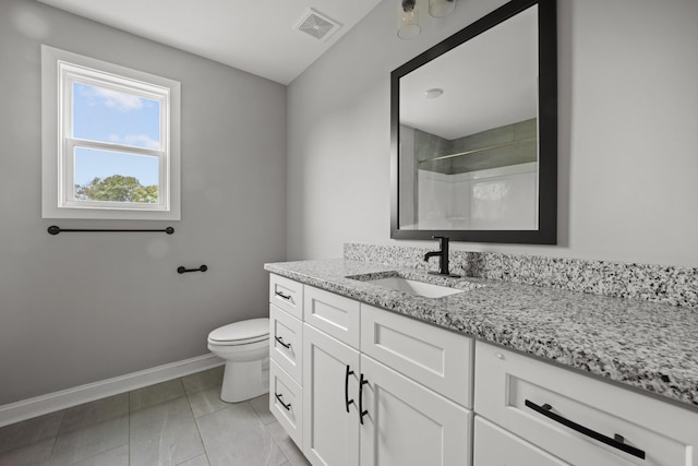 276 Indian Creek Rd, Cumberland Furnace, TN 37051 - bathroom with toilet, vanity, baseboards, and a shower