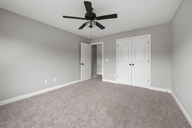 276 Indian Creek Rd, Cumberland Furnace, TN 37051 - unfurnished bedroom with carpet, baseboards, and a closet