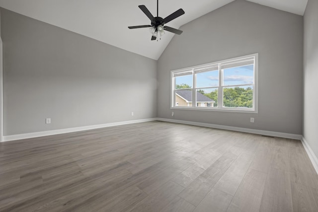 276 Indian Creek Rd, Cumberland Furnace, TN 37051 - unfurnished room with ceiling fan, wood finished floors, high vaulted ceiling, and baseboards