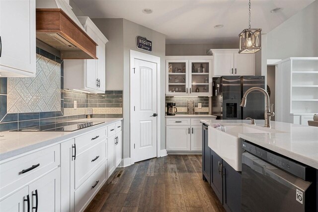 6400 Williams Rd, Cross Plains, TN 37049 - kitchen featuring dishwasher, a sink, black electric stovetop, white cabinetry, and light countertops
