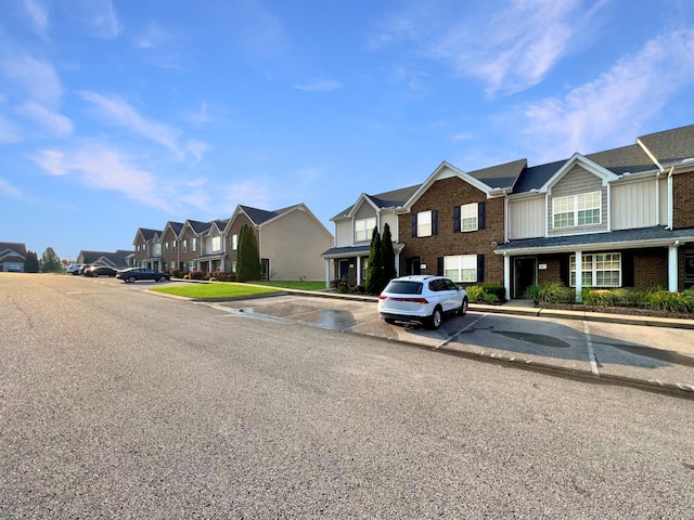4017 Pavati Trce, Spring Hill, TN 37174 - view of asphalt street featuring a residential view, curbs, and sidewalks
