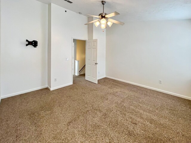 4017 Pavati Trce, Spring Hill, TN 37174 - carpeted spare room featuring a ceiling fan, baseboards, and vaulted ceiling