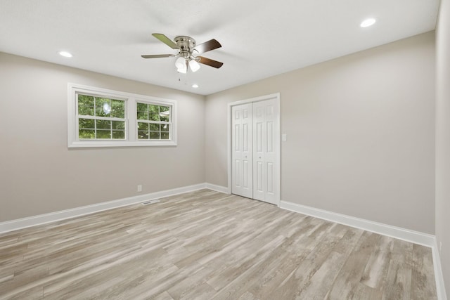 2762 Hunters Point Pike, Lebanon, TN 37087 - unfurnished bedroom featuring light wood-style flooring, a closet, recessed lighting, and a ceiling fan
