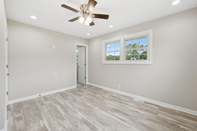 2762 Hunters Point Pike, Lebanon, TN 37087 - spare room featuring light wood-style floors, ceiling fan, and recessed lighting